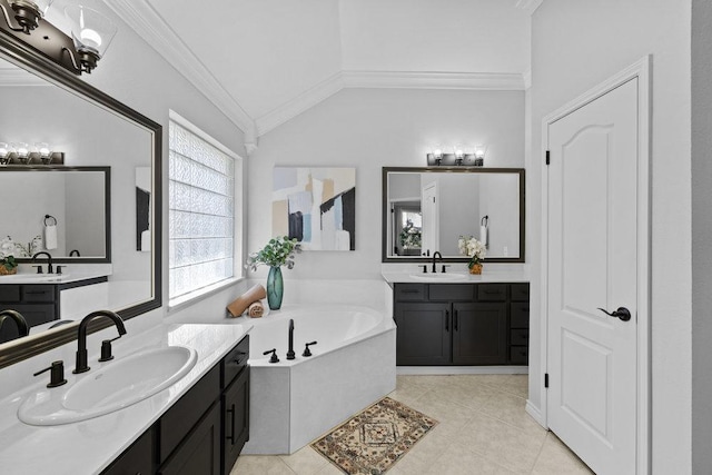 bathroom with ornamental molding, a sink, and a bath