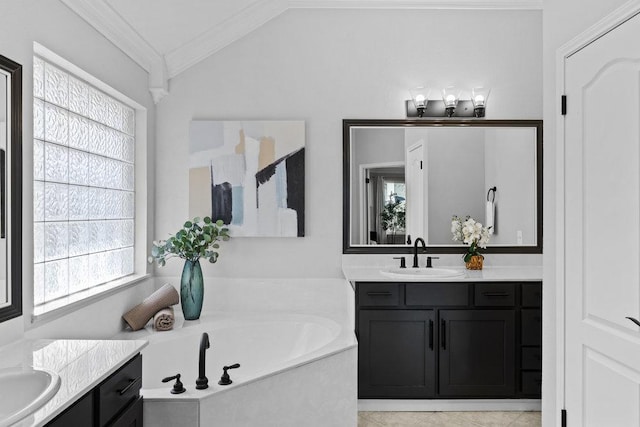 bathroom with two vanities, a sink, vaulted ceiling, a bath, and crown molding