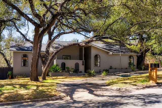 view of front of property with fence