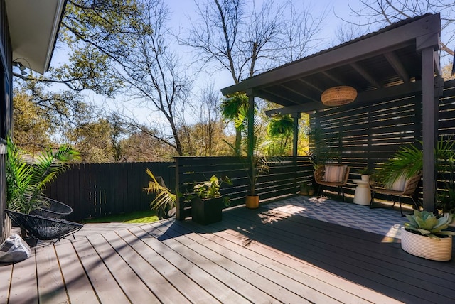 wooden deck featuring fence