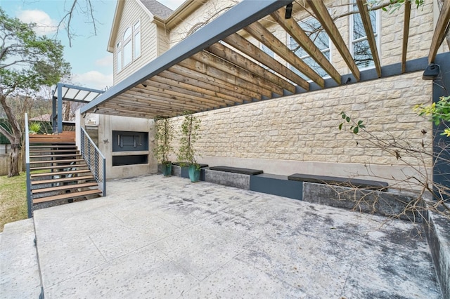 view of patio with stairway