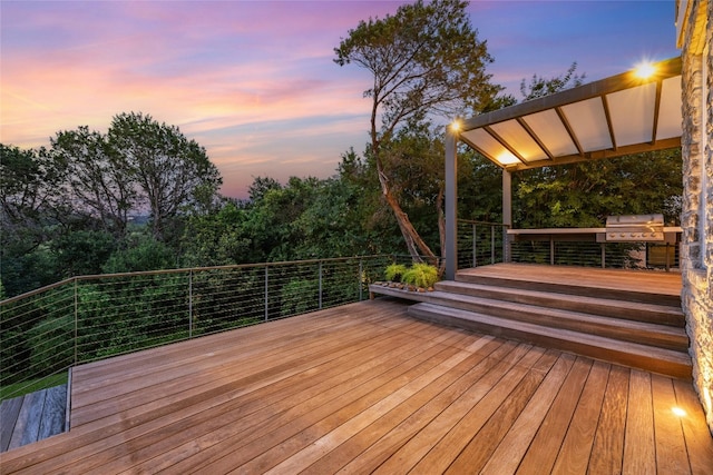 wooden deck with area for grilling