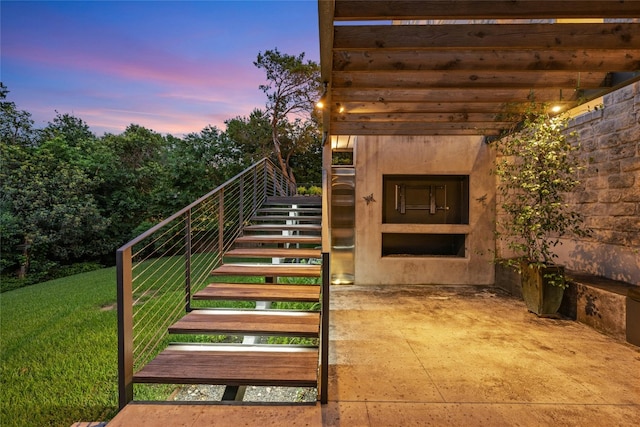 exterior space with a yard and stairway