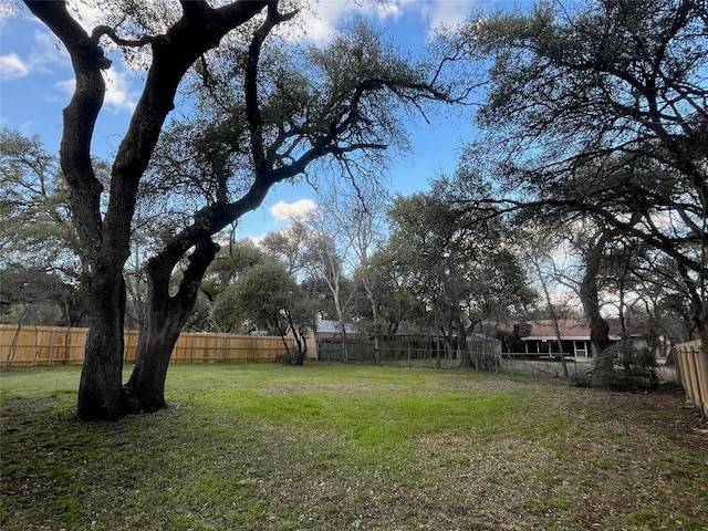 view of yard featuring fence