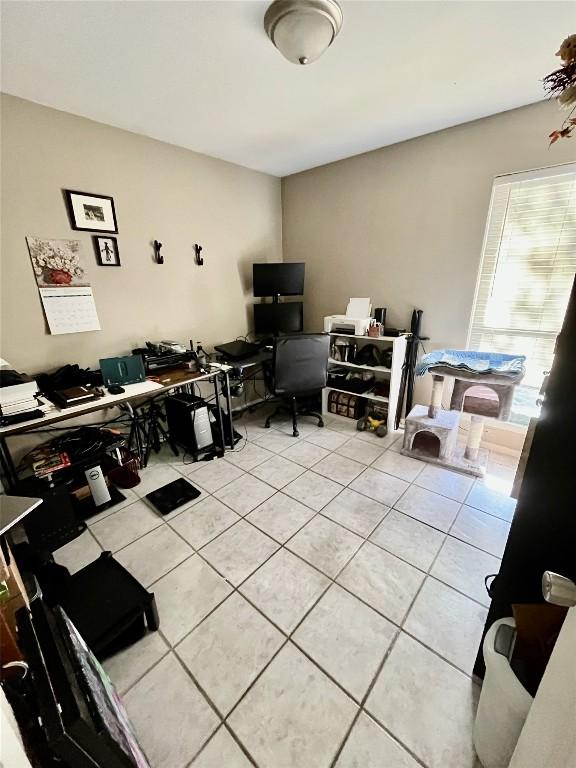 home office featuring light tile patterned floors