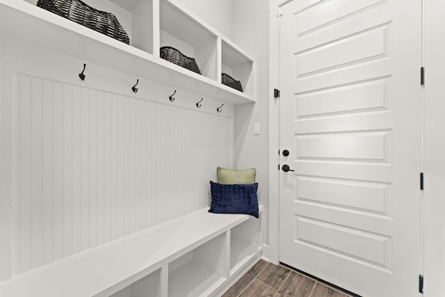 mudroom featuring dark wood-style flooring