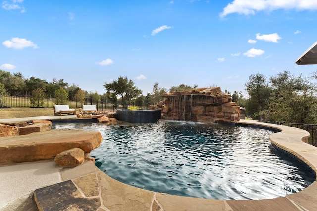 view of pool featuring a fenced in pool and fence