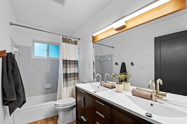 full bathroom with toilet, double vanity, shower / bath combo, and a sink