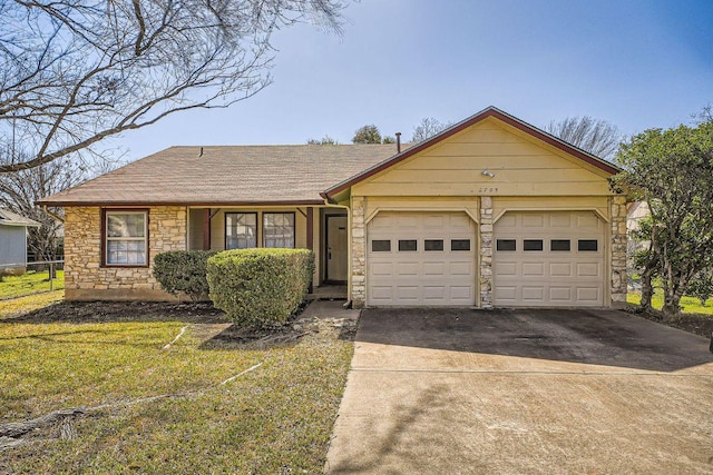 ranch-style home with a front yard, fence, a garage, stone siding, and driveway