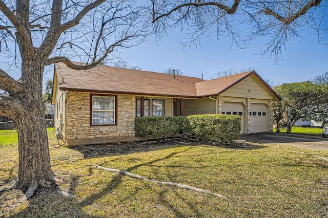 view of front of house with driveway, a garage, a shingled roof, stone siding, and a front lawn