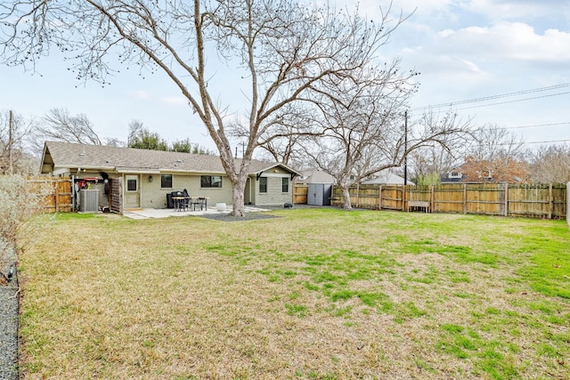 view of yard featuring a fenced backyard and a patio