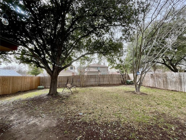 view of yard featuring a fenced backyard