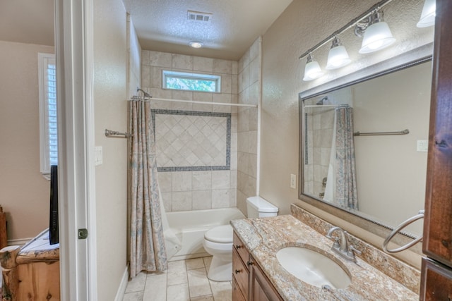 bathroom with shower / bath combination with curtain, visible vents, toilet, a textured ceiling, and vanity