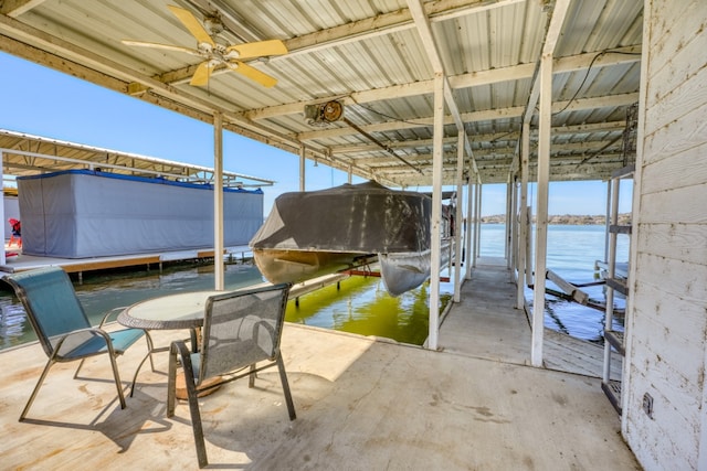 dock area featuring a water view and boat lift