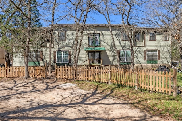 view of front of property with a fenced front yard