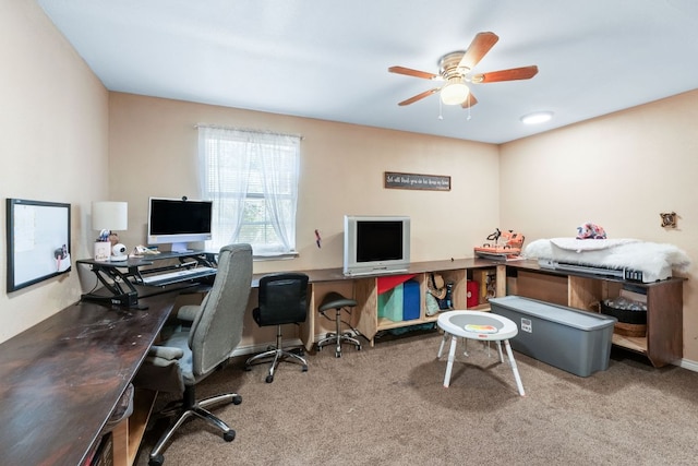 office area with carpet and ceiling fan