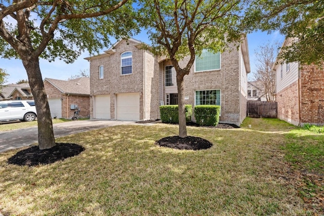 525 Golden Creek Dr, Round Rock, TX 78665 - traditional home featuring an attached garage, driveway, and brick siding