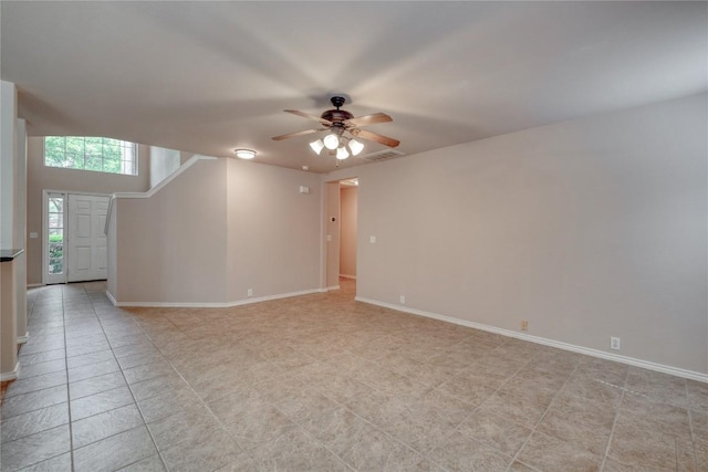 525 Golden Creek Dr, Round Rock, TX 78665 - empty room featuring a ceiling fan, baseboards, and light tile patterned floors