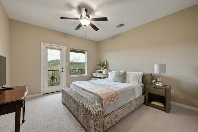 bedroom with light colored carpet, visible vents, ceiling fan, access to outside, and baseboards