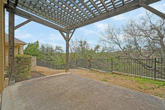 view of patio featuring a fenced backyard and a pergola