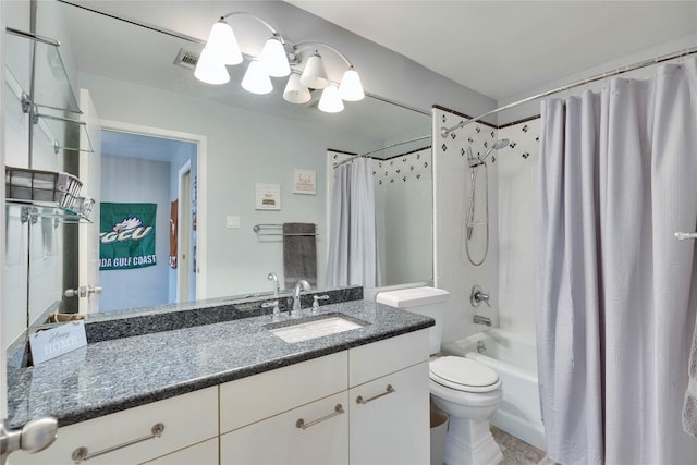 40 N Interstate 35 Hwy Unit 2D4, Austin, TX 78701 - bathroom with toilet, vanity, shower / bath combination with curtain, and a chandelier