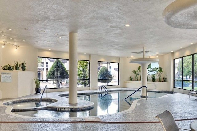 40 N Interstate 35 Hwy Unit 2D4, Austin, TX 78701 - view of swimming pool with an indoor hot tub
