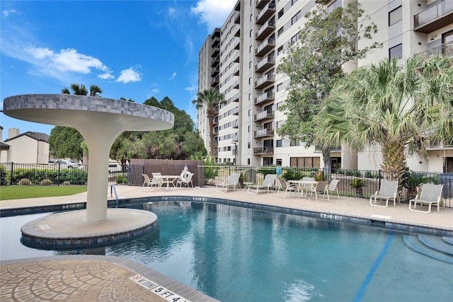 40 N Interstate 35 Hwy Unit 2D4, Austin, TX 78701 - pool with a patio and fence