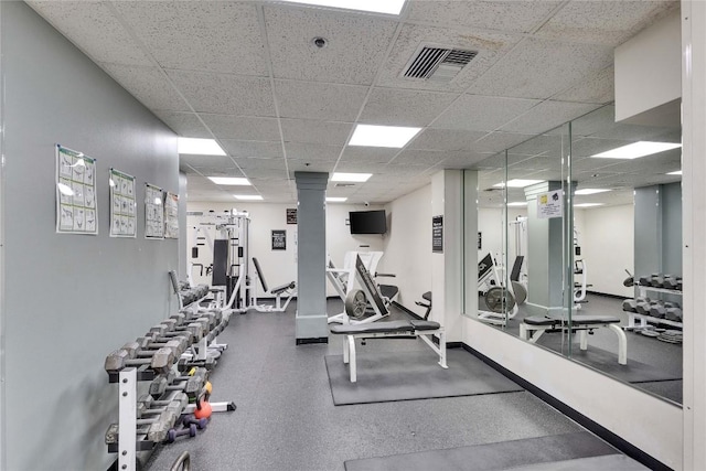 40 N Interstate 35 Hwy Unit 2D4, Austin, TX 78701 - workout area featuring a drop ceiling and baseboards