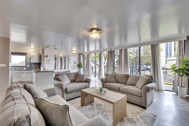 40 N Interstate 35 Hwy Unit 2D4, Austin, TX 78701 - living room with plenty of natural light, light tile patterned flooring, and a wall of windows