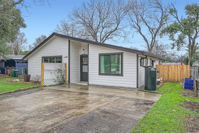 view of front of home with fence