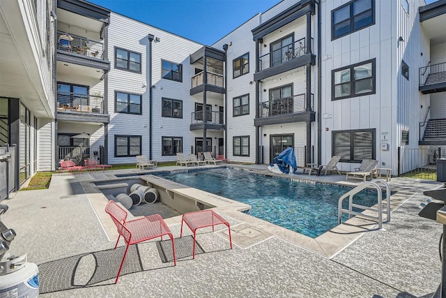 community pool featuring a patio