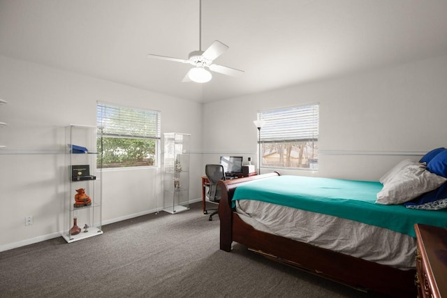 bedroom with a ceiling fan, carpet, and baseboards