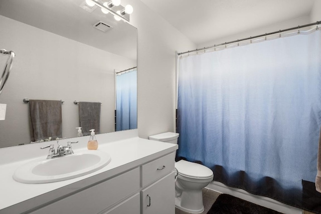 bathroom with tile patterned flooring, toilet, shower / tub combo, vanity, and visible vents