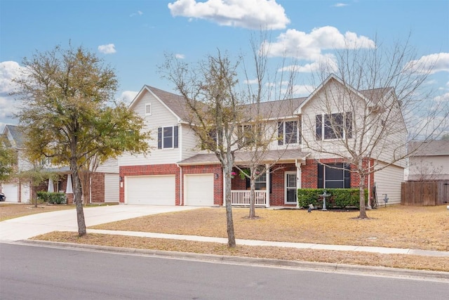 view of front of house with covered porch, a garage, brick siding, fence, and driveway