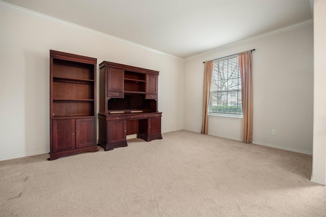 unfurnished office featuring baseboards, ornamental molding, and light colored carpet