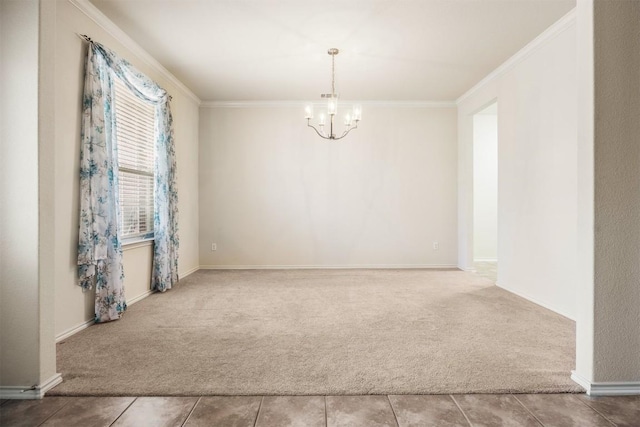 carpeted empty room featuring an inviting chandelier, baseboards, ornamental molding, and tile patterned floors