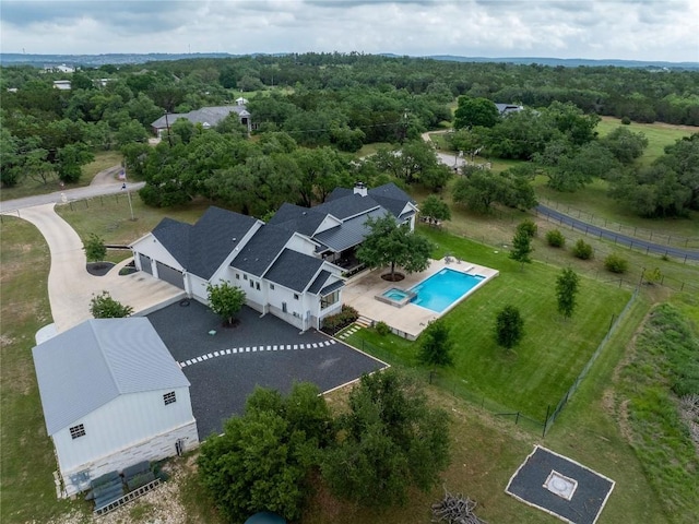 drone / aerial view with a forest view