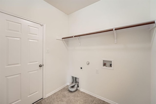 washroom with washer hookup, hookup for an electric dryer, gas dryer hookup, laundry area, and baseboards