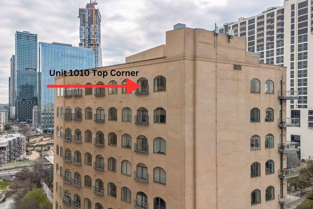 507 Sabine St Unit 1010, Austin, TX 78701 - view of building exterior featuring a view of city