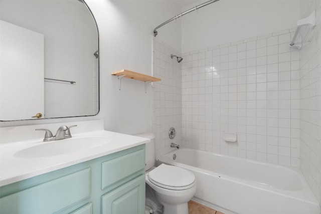 full bathroom featuring toilet, washtub / shower combination, and vanity