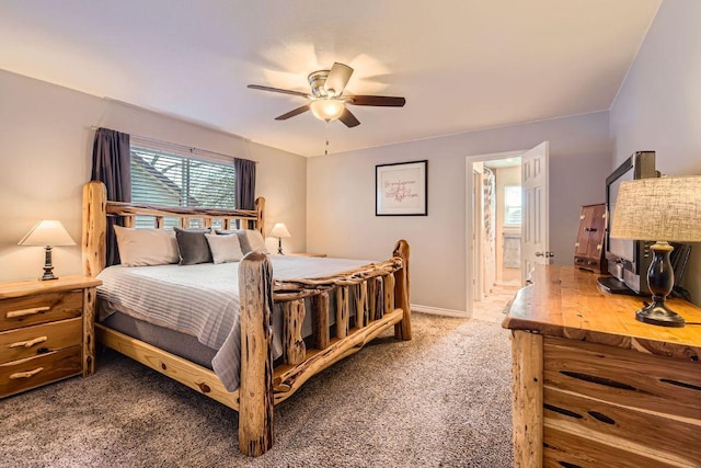 bedroom with carpet floors, ceiling fan, and baseboards