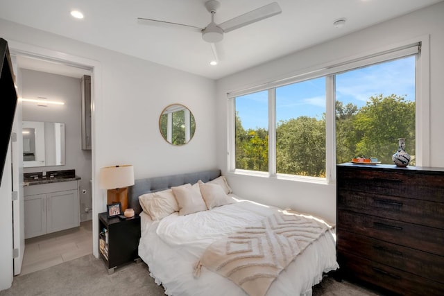 bedroom featuring a ceiling fan, recessed lighting, and connected bathroom