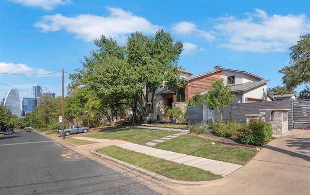 view of front of house with fence