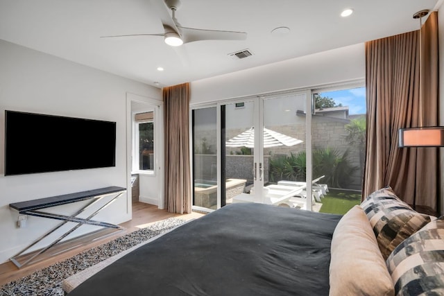 bedroom with visible vents, a ceiling fan, wood finished floors, access to outside, and recessed lighting