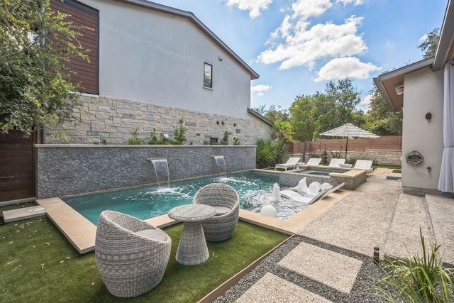 view of pool with a fenced in pool, a patio area, and a fenced backyard