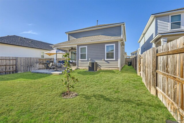 349 High Plains Pass, Liberty Hill, TX 78642 - rear view of property featuring a ceiling fan, a patio, and central air condition unit