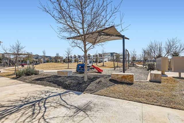 community jungle gym with a residential view