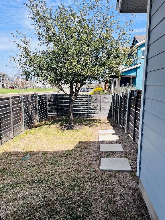 view of yard featuring a fenced backyard