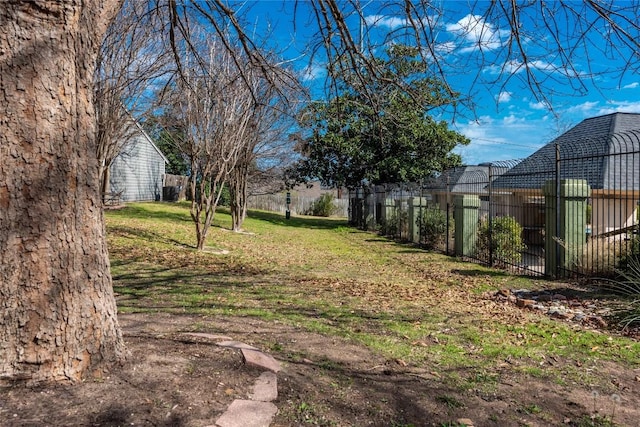 view of yard featuring fence