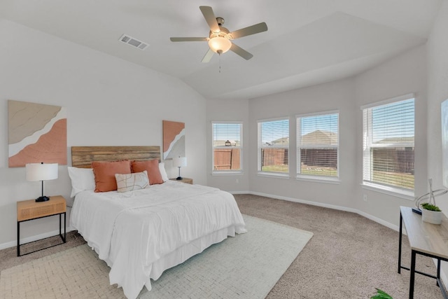 bedroom featuring ceiling fan, visible vents, baseboards, vaulted ceiling, and carpet